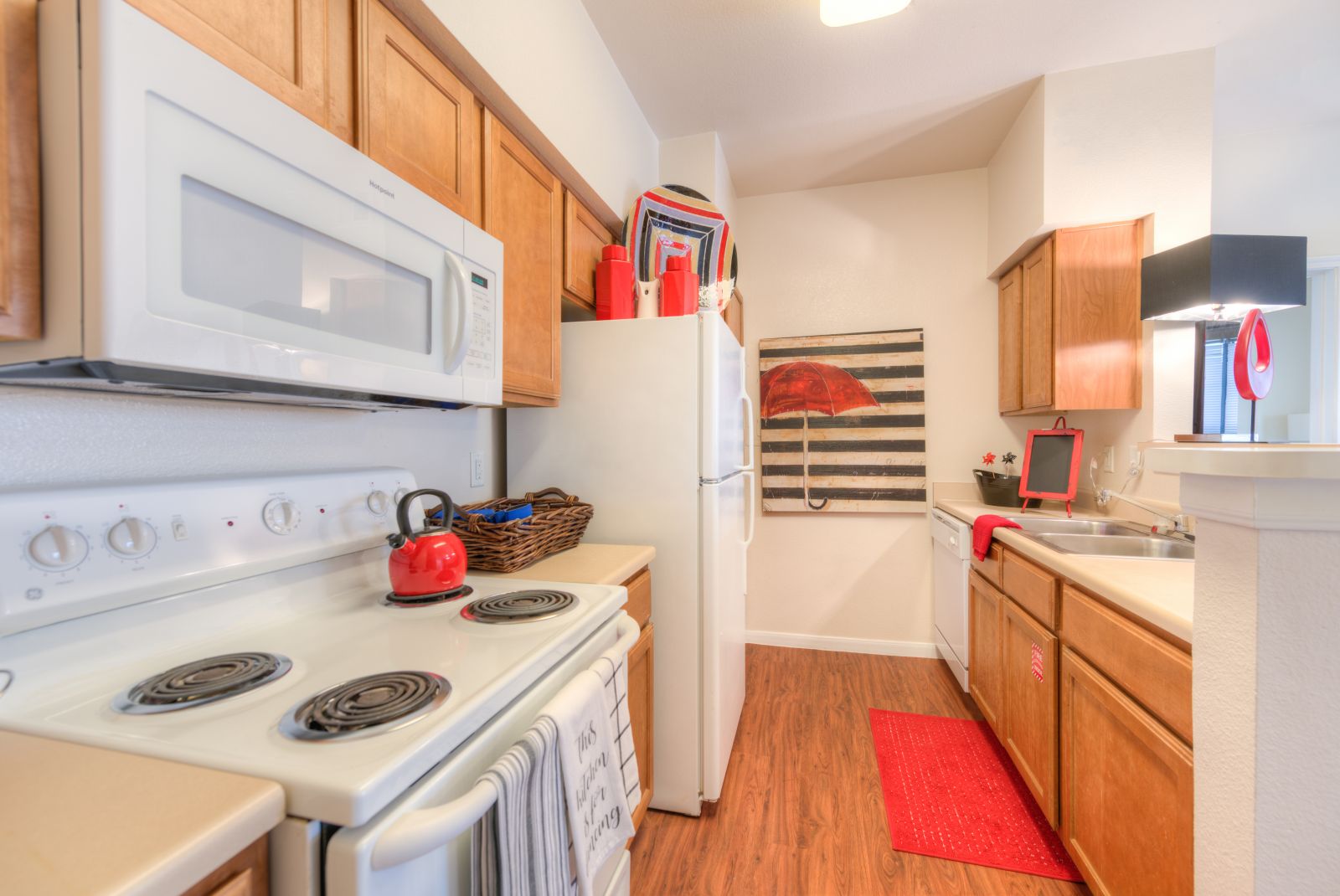 apartment kitchen with white appliances